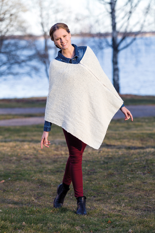 91457. PONCHO MED GLIDELÅS